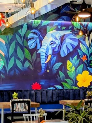 The painted elephant, our mark, on the jungle mural wall